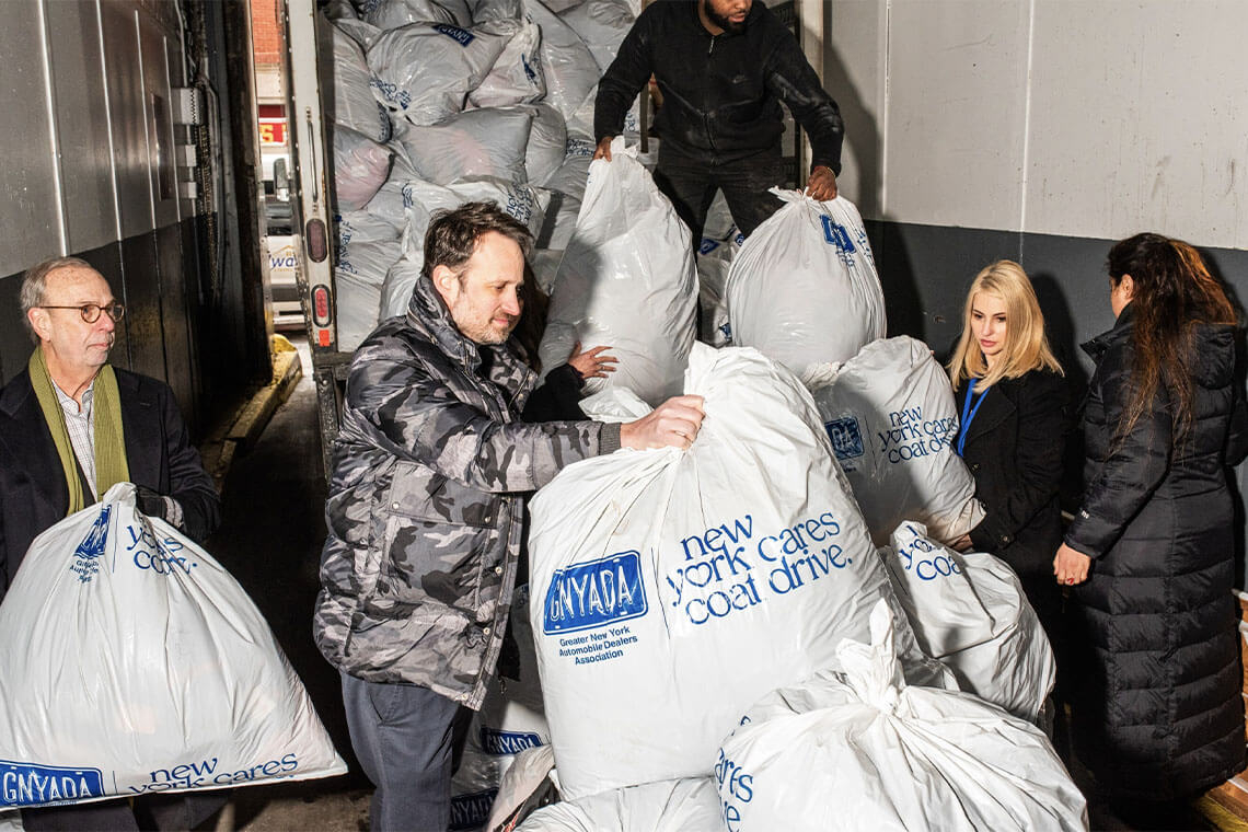 Dealer Group Delivers Coats for Children 
