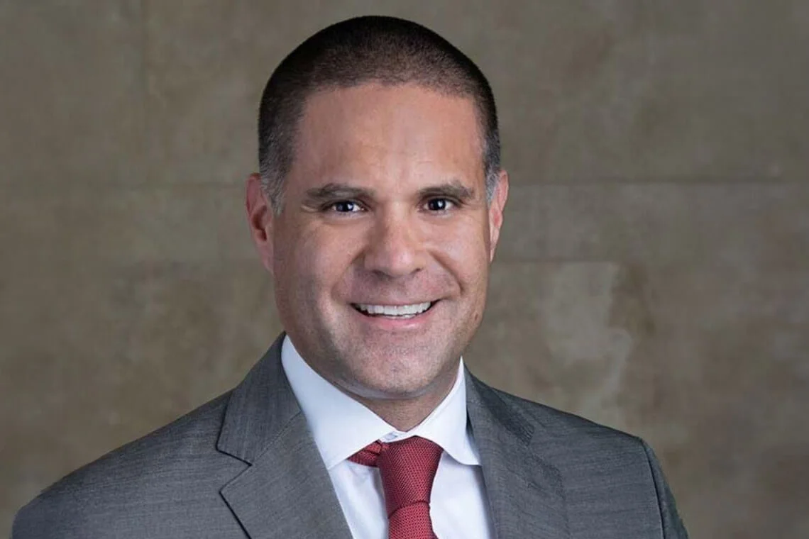 Asbury Automotive Group Reports Income Dip